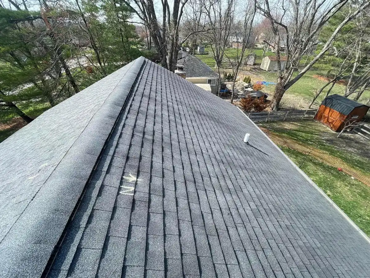 Newly installed architectural asphalt shingle roof with clean ridge line in Milford, Ohio by Abrams Restoration